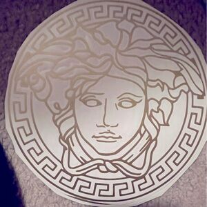This is a decal. goes on glass wood ceramic or any other flat surface